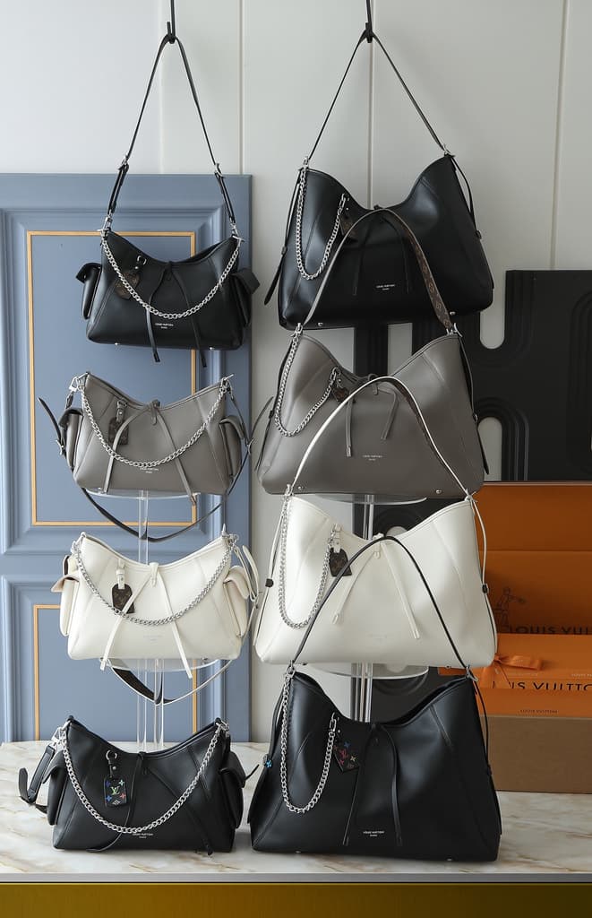 Louis Vuitton CarryAll MM Hobo Bag